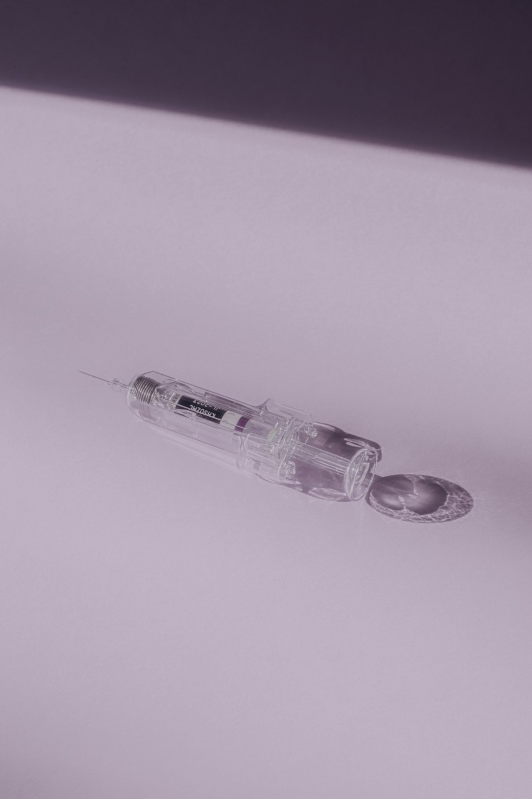 Vial and syringe representing epithalon peptide research and protocol tracking
